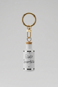 Porte-clés flacon en porcelaine « Elixir Sinceritatis » (5,5 cm)